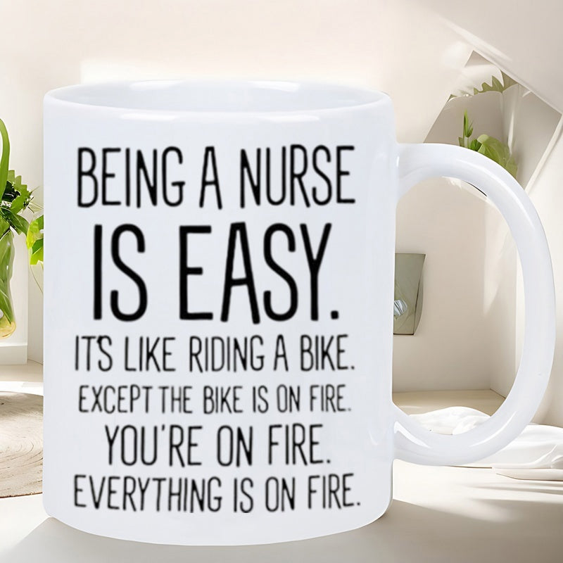 Tailorly White Ceramic 11 oz Mug - Being A Nurse Is Easy It Is Like Riding A Bike Except The Bike Is On Fire You Are On Fire Everything Is On Fire Minimalist