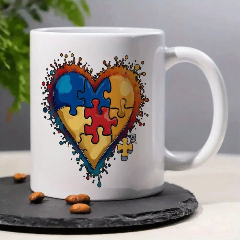 Tailorly White Ceramic 11 oz Mug - Colorful Interlocking Puzzle Pieces Arranged Inside A Splattered Paint Effect Heart