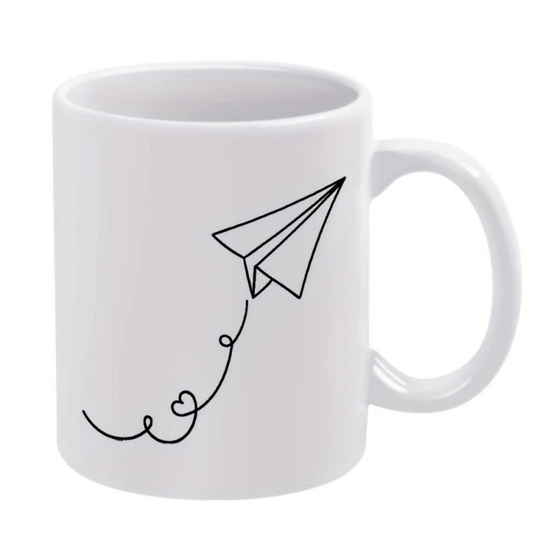 Tailorly White Ceramic 11 oz Mug - Minimalist Black Line Drawing Featuring Heart Shaped Trailing Flight Path Paper Airplane