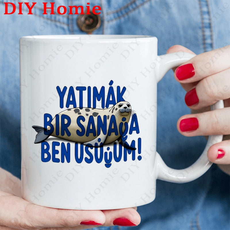 Tailorly White Ceramic 11 oz Mug - Spotted Animal Resting Against Bold Blue Artistic Text Lettering Seal