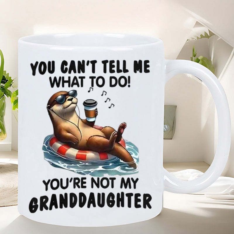 Tailorly White Ceramic 11 oz Mug - You Can't Tell Me What To Do You're Not My Granddaughter Cool Brown Otter Wearing Sunglasses Relaxing On Lifebuoy Floating On