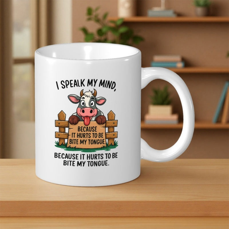 Tailorly White Ceramic 11 oz Mug - I Speak My Mind Because It Hurts To Be Bite My Tongue Playful Cartoon Spotted Animal Leaning Over Rustic Wooden Fence Sticking
