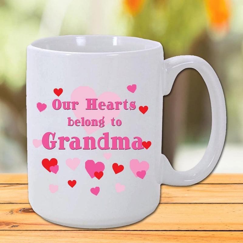Tailorly White Ceramic 11 oz Mug - Our Hearts Belong To Grandma Many Small Pink And Red Hearts Surrounding A Loving Message Heart