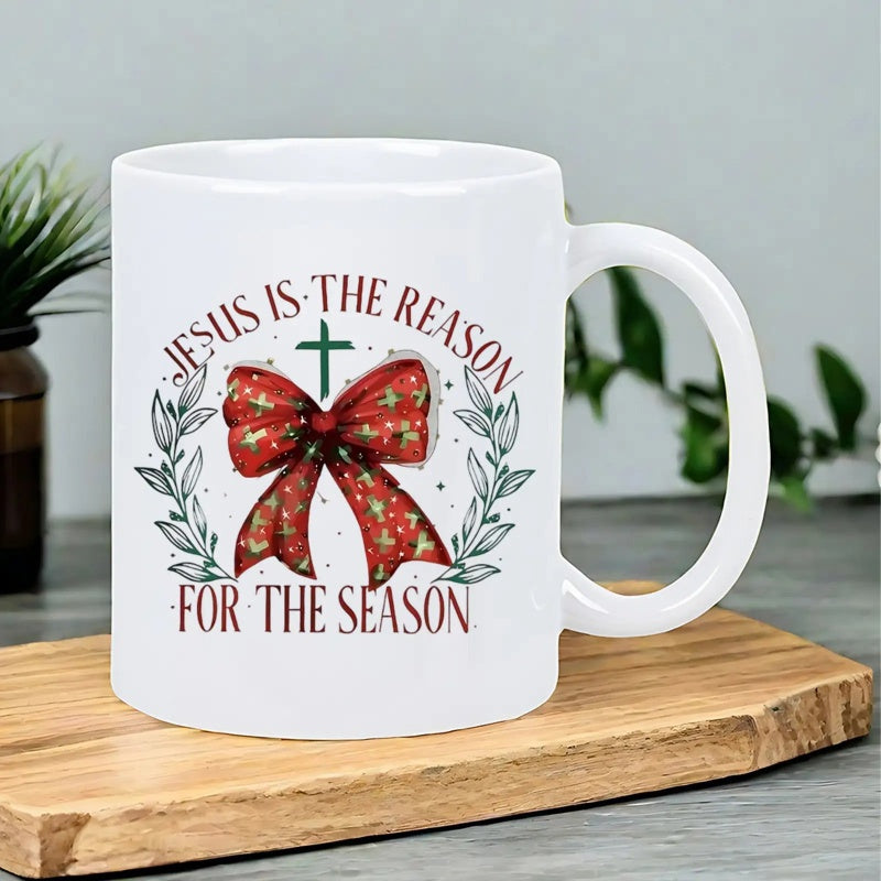 Tailorly White Ceramic 11 oz Mug - Jesus Is The Reason For The Season Red Festive Bow With Small Green Cross Among Delicate Leafy Wreaths Mug
