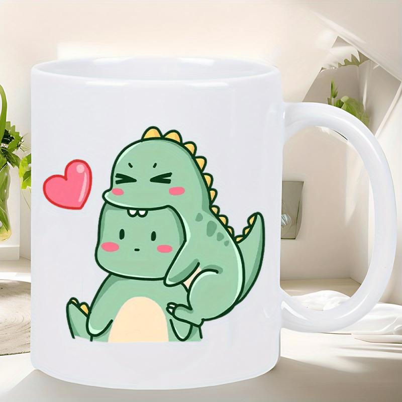 Tailorly White Ceramic 11 oz Mug - Two Adorable Little Green Cartoon Dinosaurs Playing With Pink Heart Dinosaur