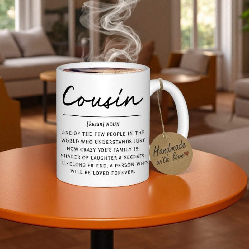 Tailorly White Ceramic 11 oz Mug - Cousin Noun Handmade With Love Minimalist White Ceramic Cup With Wispy Steam Rising On Table Mug