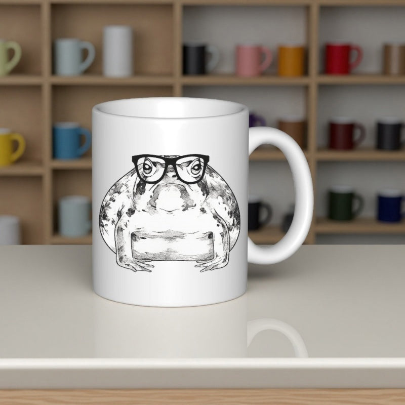 Tailorly White Ceramic 11 oz Mug - Whimsical Hand Drawn Toad Wearing Black Nerd Glasses Sitting Quietly Toad