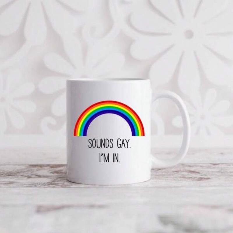 Tailorly White Ceramic 11 oz Mug - Sounds Gay I'm In Vibrant Colorful Arc Floating Above A Clean Centered Minimalist Pride Rainbow