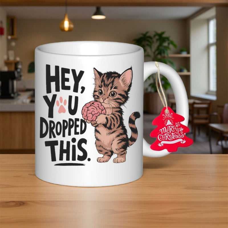 Tailorly White Ceramic 11 oz Mug - Hey You Dropped This Cute Tabby Kitten Holding A Pink Human Brain Kitten
