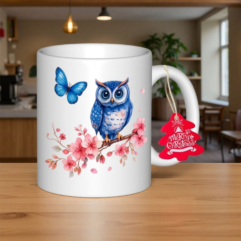 Tailorly White Ceramic 11 oz Mug - Merry Christmas Blue Butterfly Flying Over Pink Blossoms Near A Wise Blue Owl