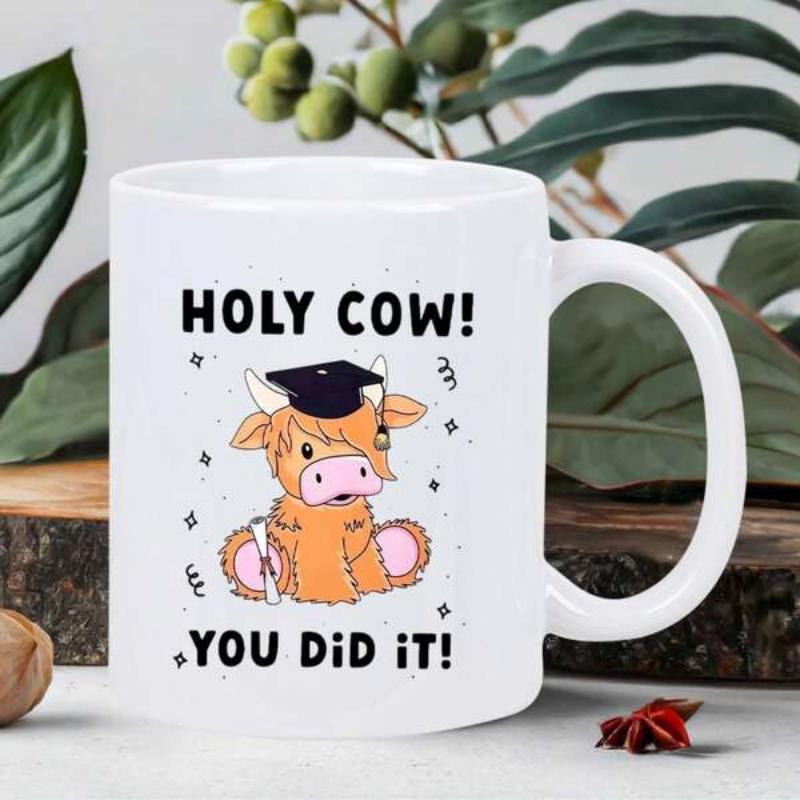 Tailorly White Ceramic 11 oz Mug - Holy Cow You Did It Cute Brown Shaggy Highland Cow Wearing Black Graduation Cap Holding Diploma Cow