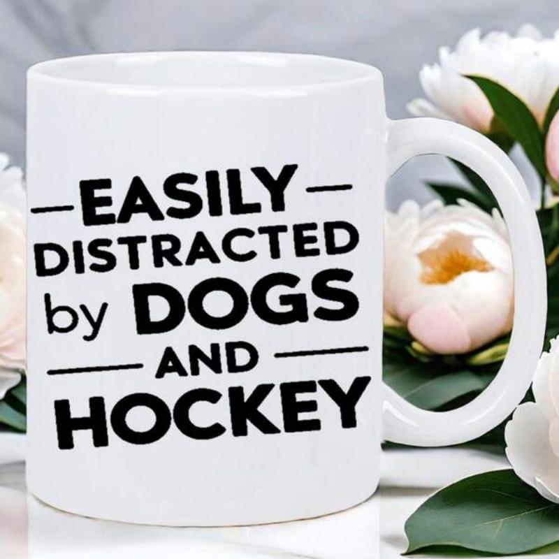Tailorly White Ceramic 11 oz Mug - Easily Distracted By Dogs And Hockey Minimalist Bold Black Sans Serif Script Arranged In Balanced Horizontal Lines Typography