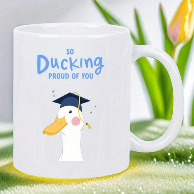 Tailorly White Ceramic 11 oz Mug - So Ducking Proud Of You Cute White Bird Wearing Black Graduation Cap And Gold Tassel Duck