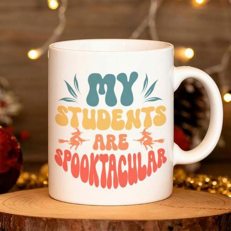 Tailorly White Ceramic 11 oz Mug - My Students Are Spooktacular White Ceramic Background Featuring Retro Groovy Letters With Flying Witch Silhouettes Mug