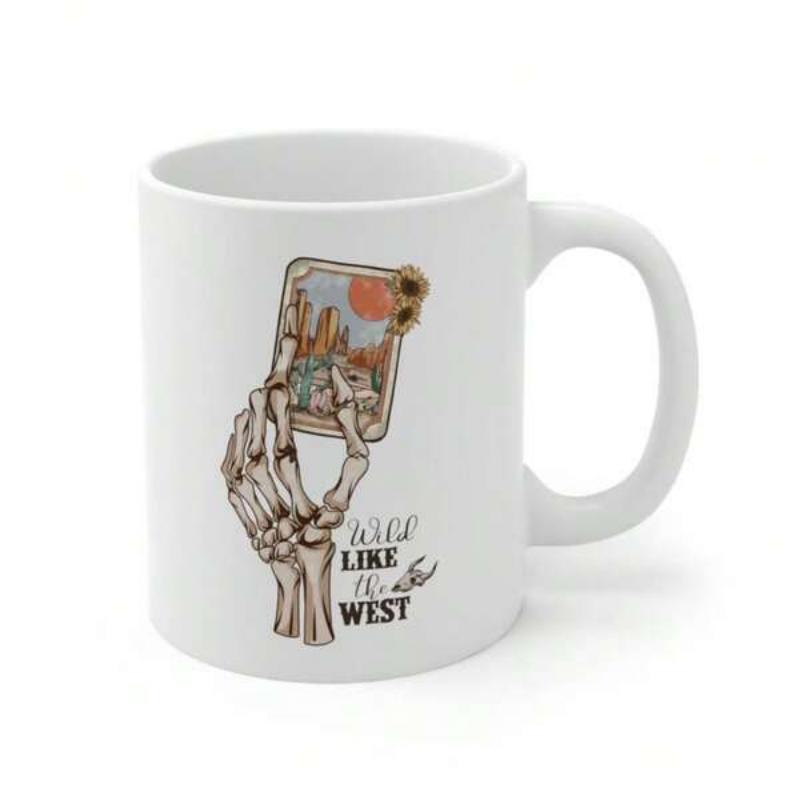 Tailorly White Ceramic 11 oz Mug - Wild Like The West Skeleton Hand Holding A Desert Card Under The Golden Sun Skeleton Hand