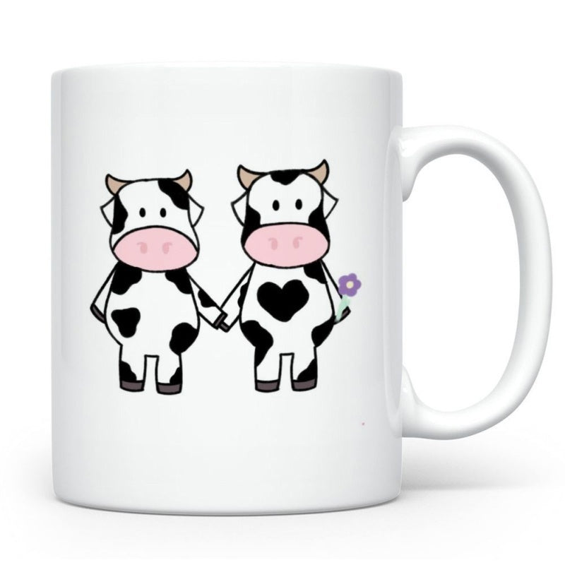 Tailorly White Ceramic 11 oz Mug - Two Adorable Spotted Cartoon Cows Holding Hands With Tiny Purple Flower Cow
