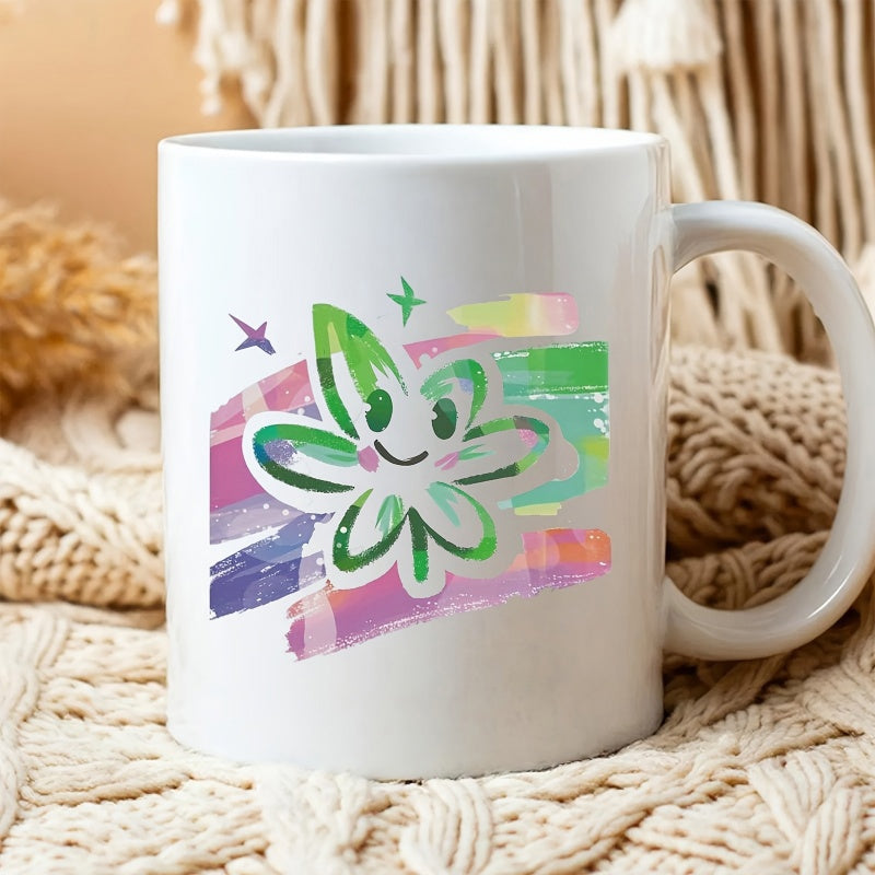 Tailorly White Ceramic 11 oz Mug - Vibrant Colorful Brushstrokes Behind A Cute Smiling Green Cartoon Character Leaf