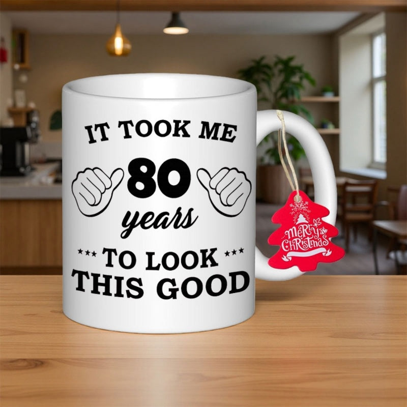 Tailorly White Ceramic 11 oz Mug - It Took Me 80 Years To Look This Good Two Pointing Thumbs Emphasizing Humorous Birthday Slogan Under Elegant Script Font Mug