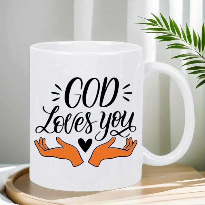 Tailorly White Ceramic 11 oz Mug - God Loves You Stylized Uplifted Orange Human Hands Holding A Tiny Black Heart Mug