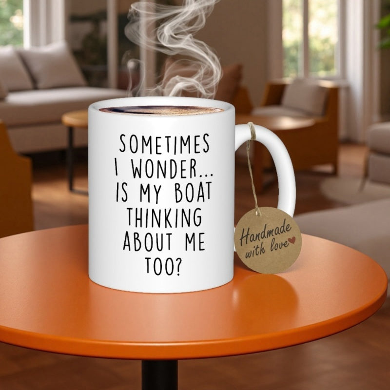 Tailorly White Ceramic 11 oz Mug - Sometimes I Wonder Is My Boat Thinking About Me Too Steaming White Ceramic Cup Resting Upon Circular Orange Table Surface Mug