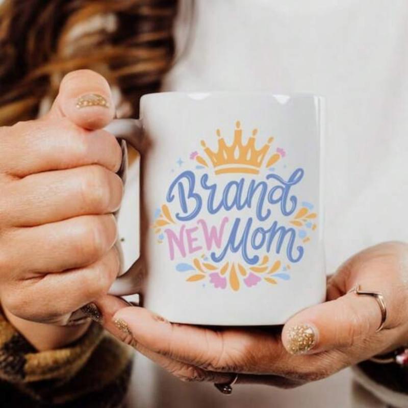Tailorly White Ceramic 11 oz Mug - Brand New Mom Elegant Golden Crown Resting Among Colorful Blossoming Floral Swirls Mug
