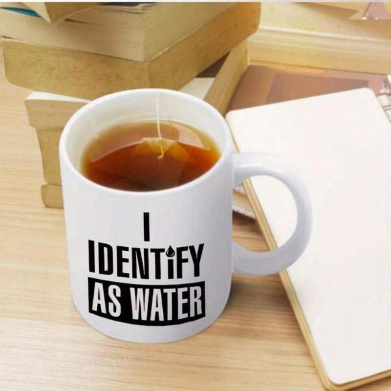 Tailorly White Ceramic 11 oz Mug - I Identify As Water Modern Minimalist White Porcelain Cup Sitting On Smooth Wooden Table Mug