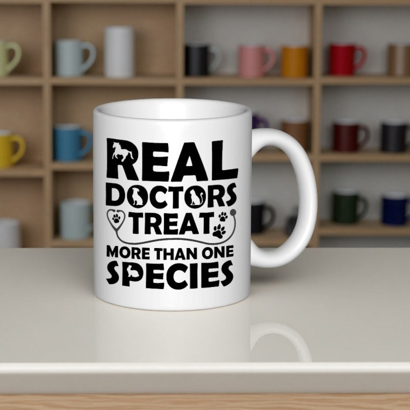 Tailorly White Ceramic 11 oz Mug - Real Doctors Treat More Than One Species Bold Typography Featuring Animal Silhouettes And Stethoscope Heart Design