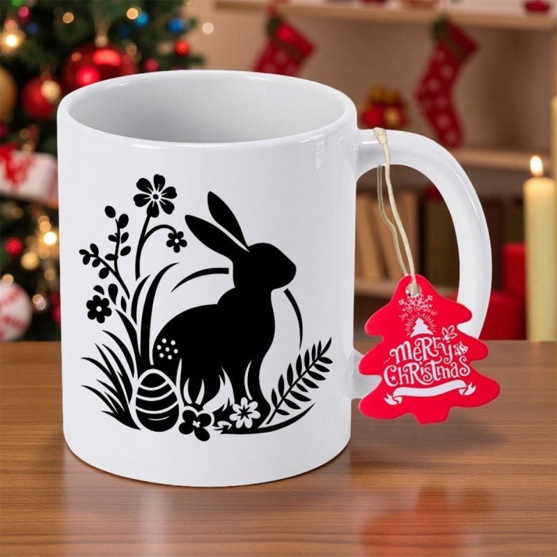 Tailorly White Ceramic 11 oz Mug - Elegant Silhouette Resting Among Spring Flowers Beside A Decorative Easter Egg Rabbit
