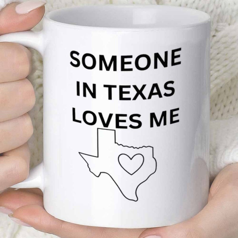 Tailorly White Ceramic 11 oz Mug - Someone In Texas Loves Me Minimalist Black Outline Showing Texas State Boundary Featuring A Central Heart Map
