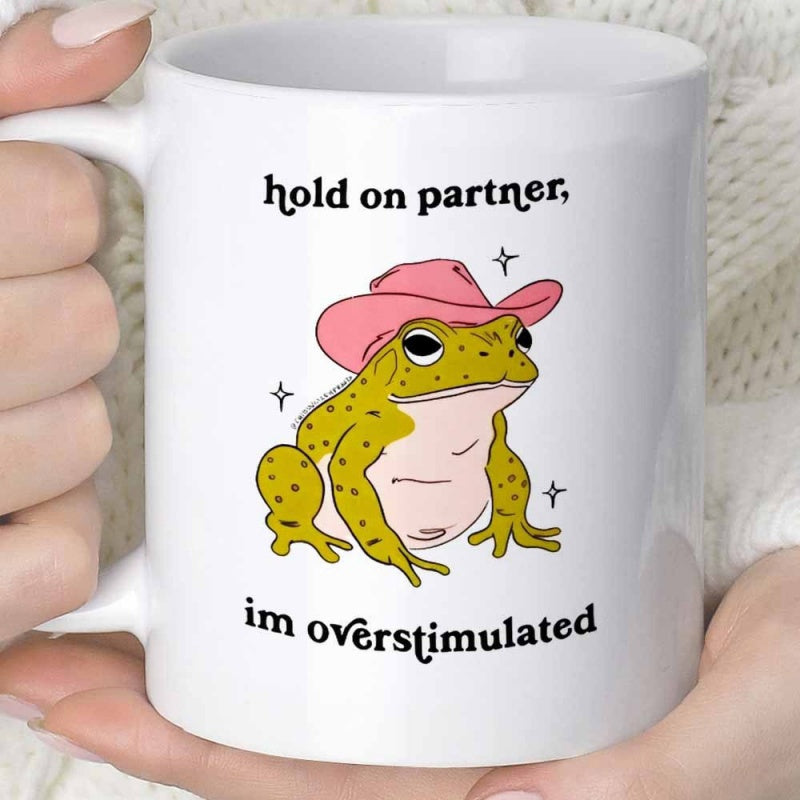 Tailorly White Ceramic 11 oz Mug - Hold On Partner Im Overstimulated Green Speckled Frog Wearing Pink Cowboy Hat Surrounded By Shining Little Stars Toad
