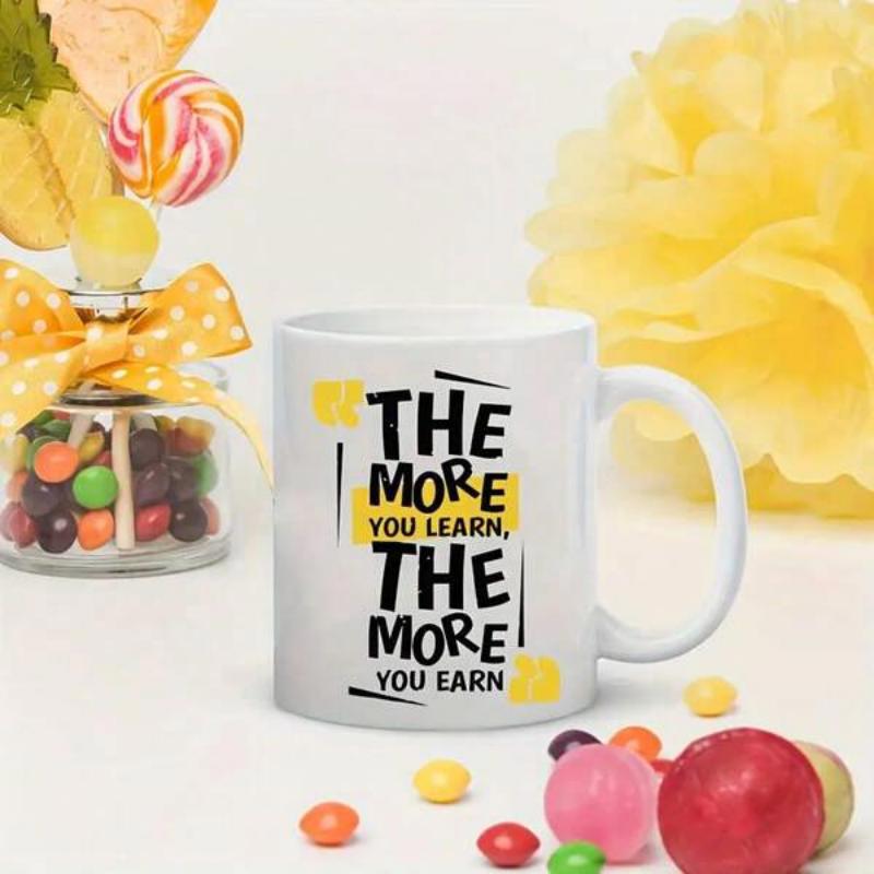 Tailorly White Ceramic 11 oz Mug - The More You Learn The More You Earn Minimalist White Ceramic Vessel With Bold Black Text And Yellow Accents Mug