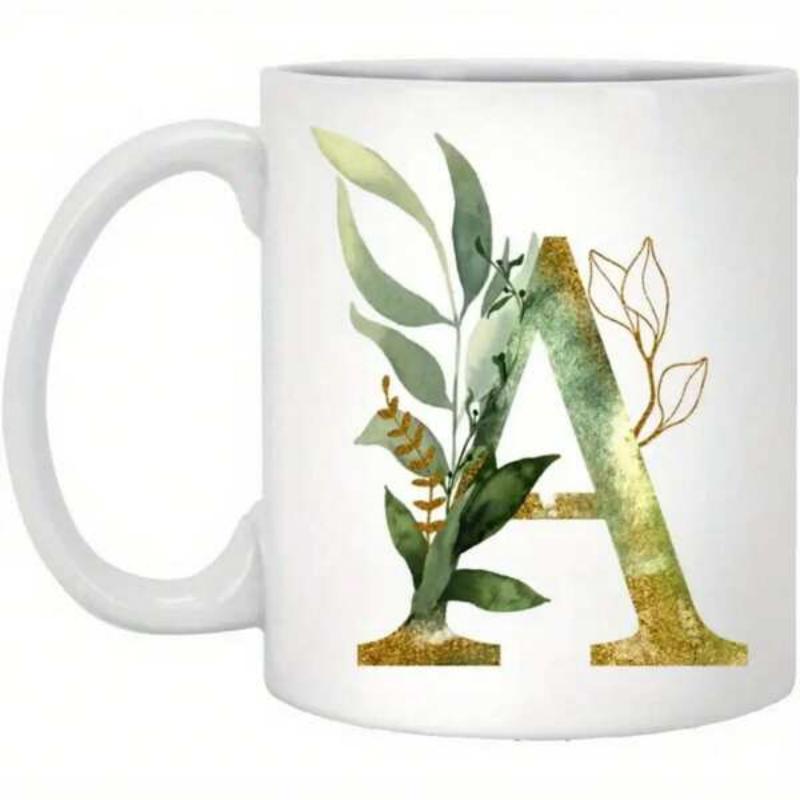 Tailorly White Ceramic 11 oz Mug - A Elegant Botanical Green Leaves With Golden Outline Decorating A Textured Capital Letter