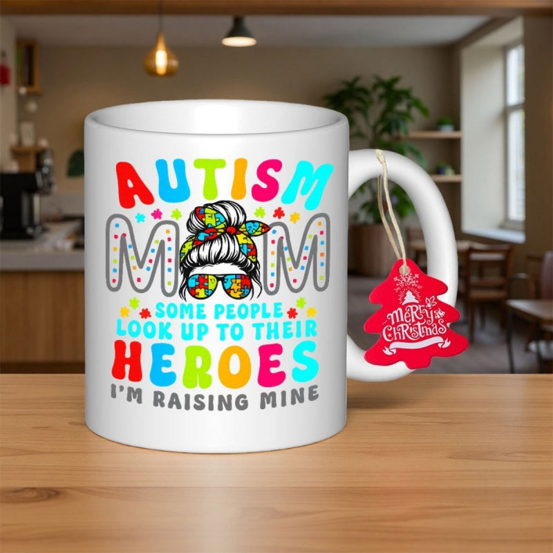 Tailorly White Ceramic 11 oz Mug - Autism Mom Some People Look Up To Their Heroes Im Raising Mine Messy Bun With Puzzle Pattern Headband And Glasses Graphic