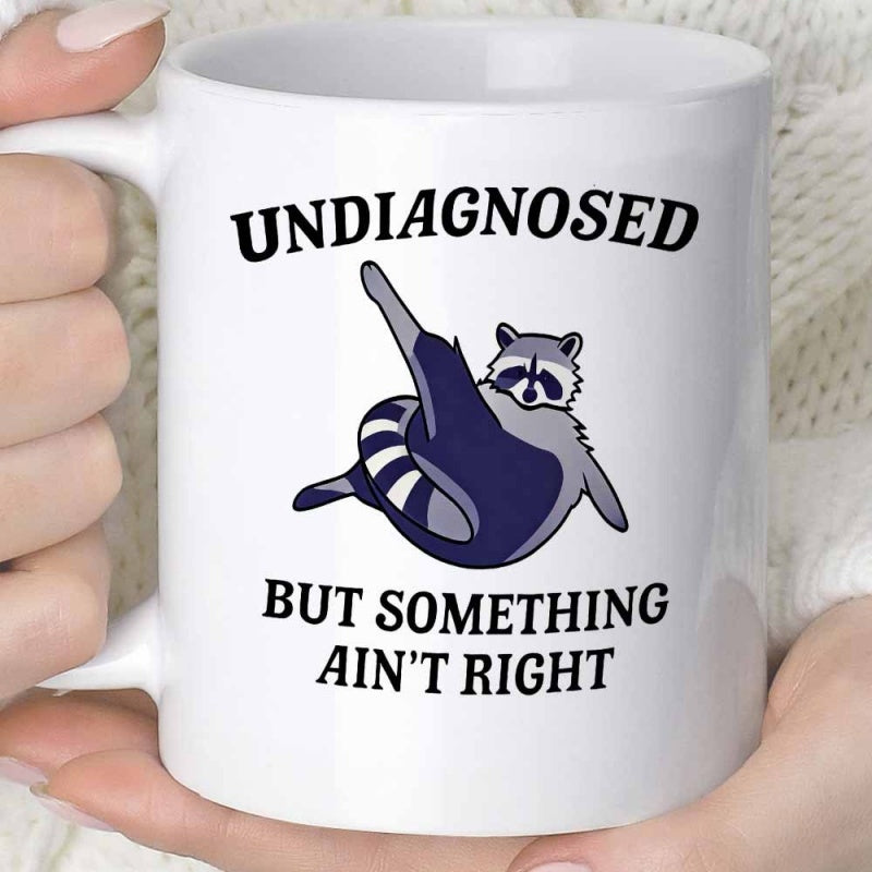Tailorly White Ceramic 11 oz Mug - Undiagnosed But Something Ain't Right Hilarious Chubby Raccoon Lifting One Leg In Funny Pose Raccoon