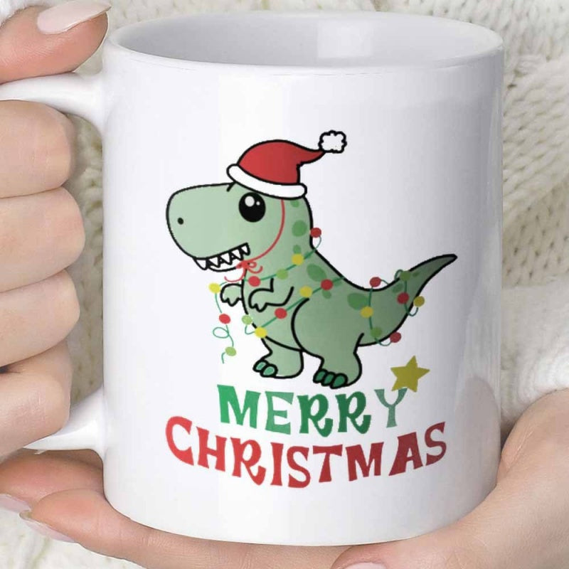 Tailorly White Ceramic 11 oz Mug - Merry Christmas Cute Cartoon Green Tyrannosaurus Wearing Santa Hat Wrapped In Festive Christmas Lights Dinosaur