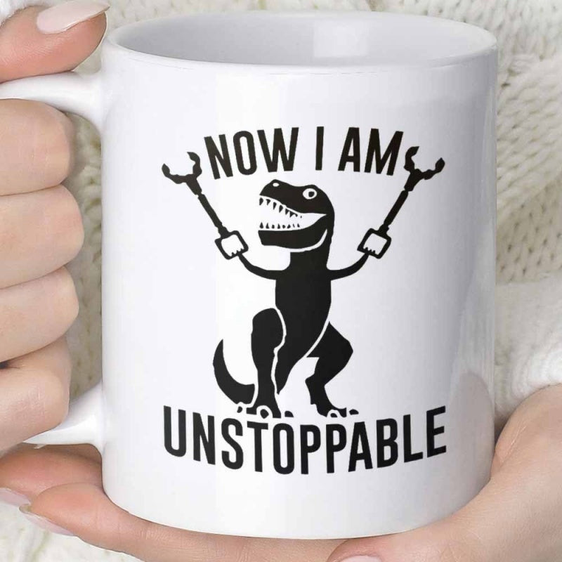 Tailorly White Ceramic 11 oz Mug - Now I Am Unstoppable Humorous Cartoon Dinosaur Holding Reacher Tools Among Bold Black Block Letters T-Rex