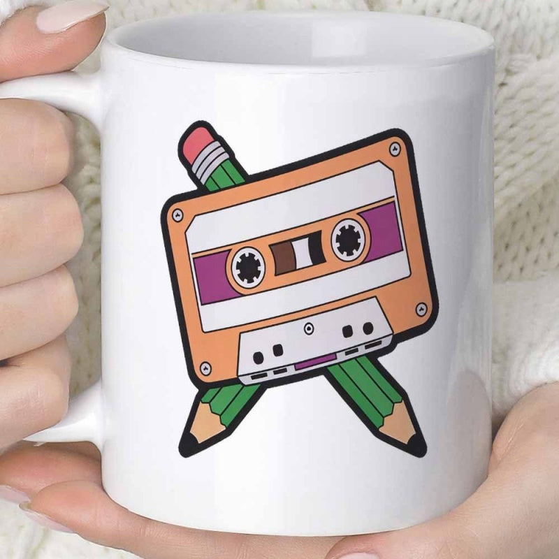 Tailorly White Ceramic 11 oz Mug - Vintage Orange Audio Tape Crossed With A Sharpened Green Wooden Pencil Cassette