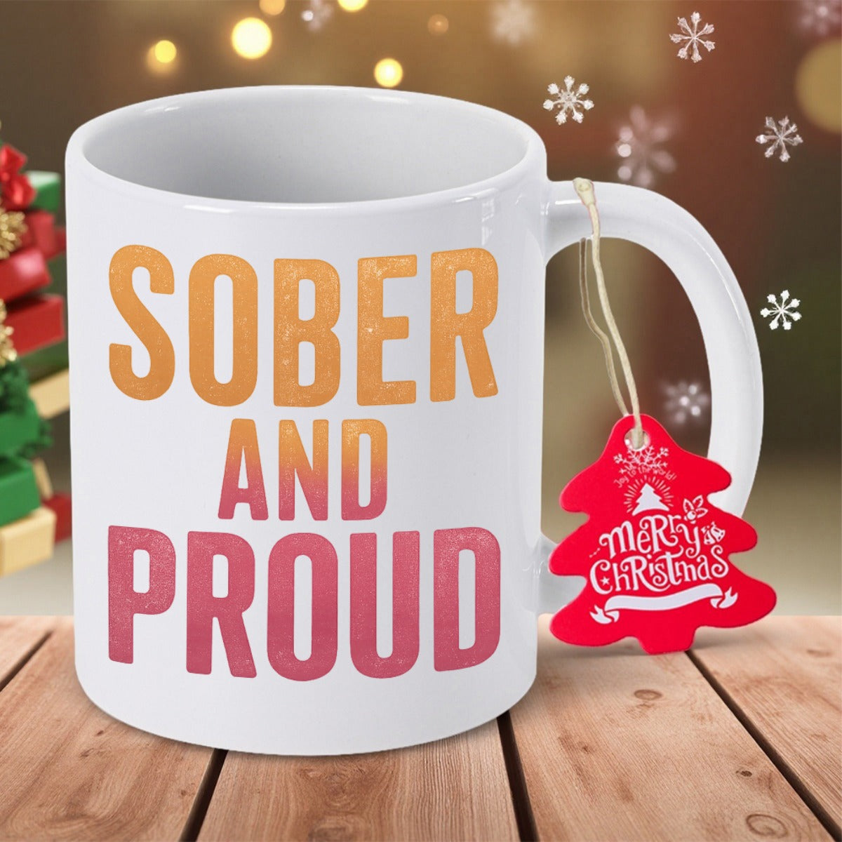 Tailorly White Ceramic 11 oz Mug - Sober And Proud Merry Christmas Bold Vibrant Gradient Lettering Accompanied By A Festive Tree Shaped Tag Mug