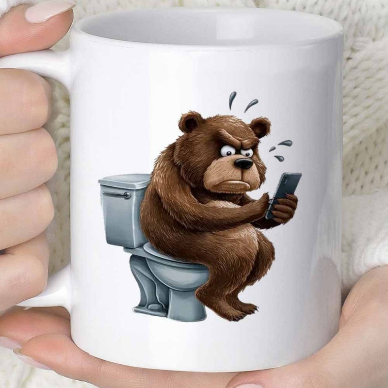 Tailorly White Ceramic 11 oz Mug - Grumpy Brown Bear Sitting On Toilet Holding Smartphone With Frustrated Expression Bear