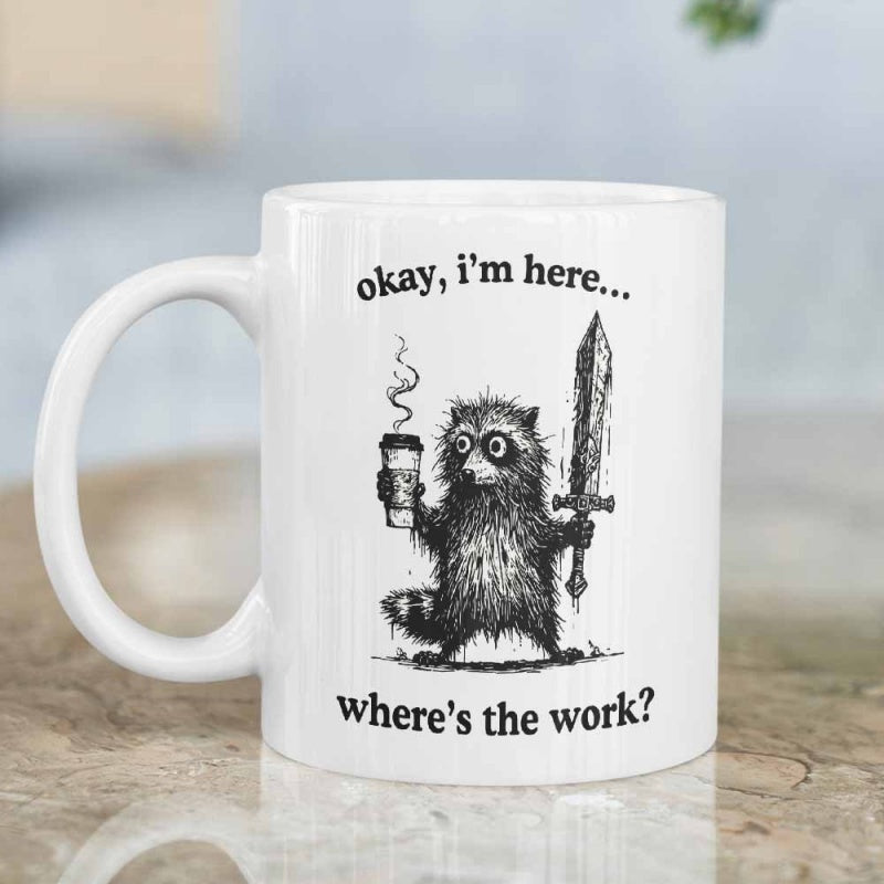 Tailorly White Ceramic 11 oz Mug - Okay Im Here Wheres The Work Messy Fur Holding Hot Coffee And Large Sword Standing Alertly Raccoon
