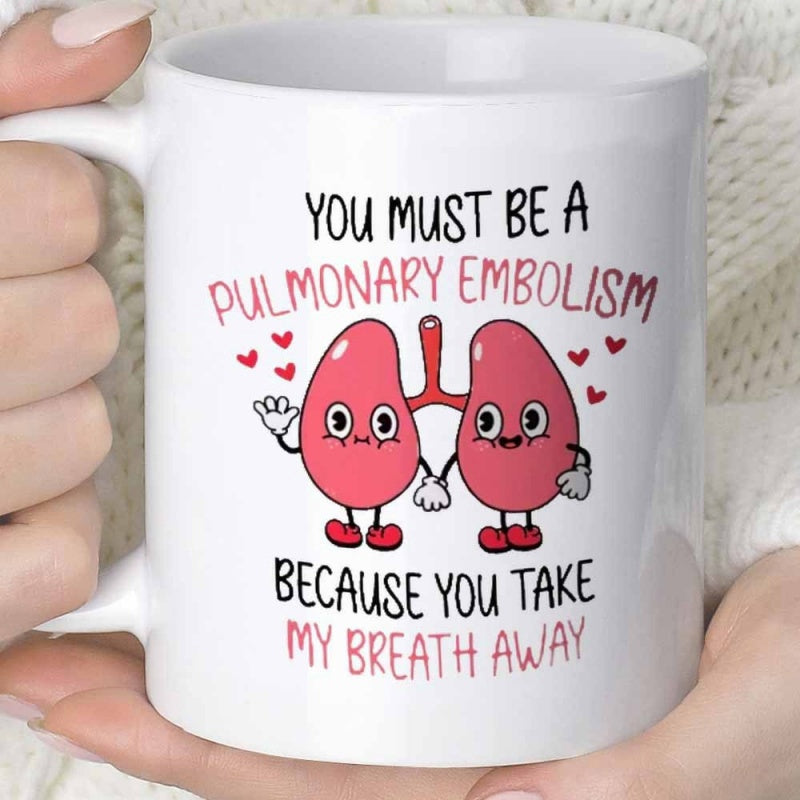 Tailorly White Ceramic 11 oz Mug - You Must Be A Pulmonary Embolism Because You Take My Breath Away Two Cute Cartoonish Lungs Holding Hands Surrounded By Tiny Red