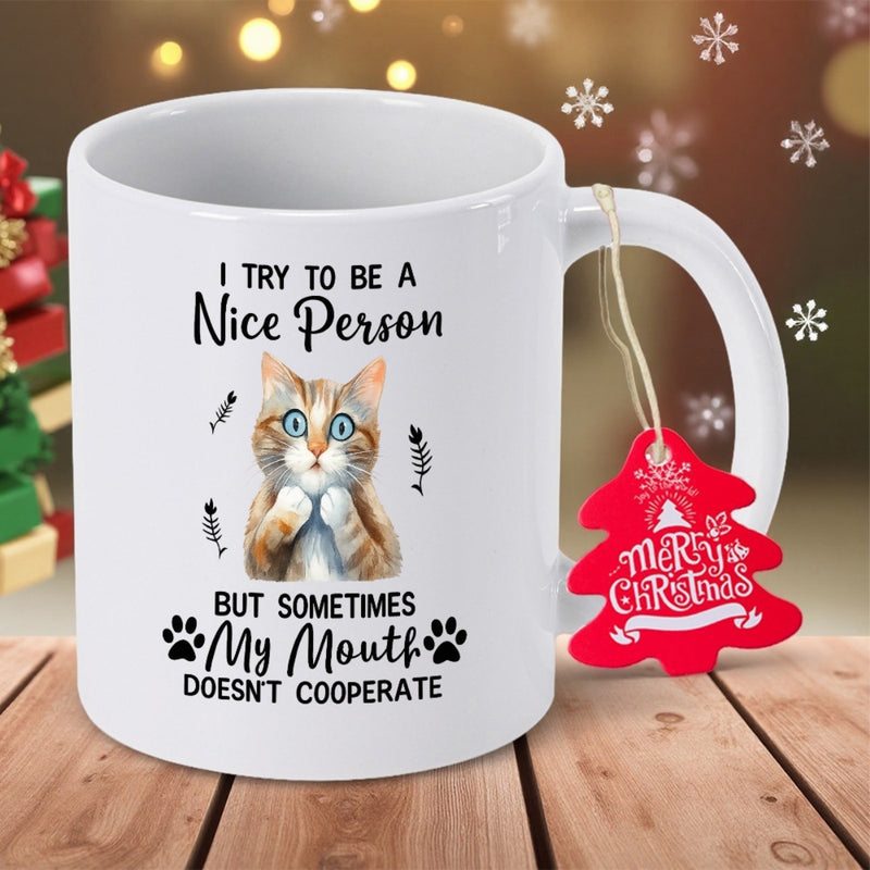 Tailorly White Ceramic 11 oz Mug - I Try To Be A Nice Person But Sometimes My Mouth Doesnt Cooperate Surprised Ginger Tabby Cat With Small Fish Bones And Paw