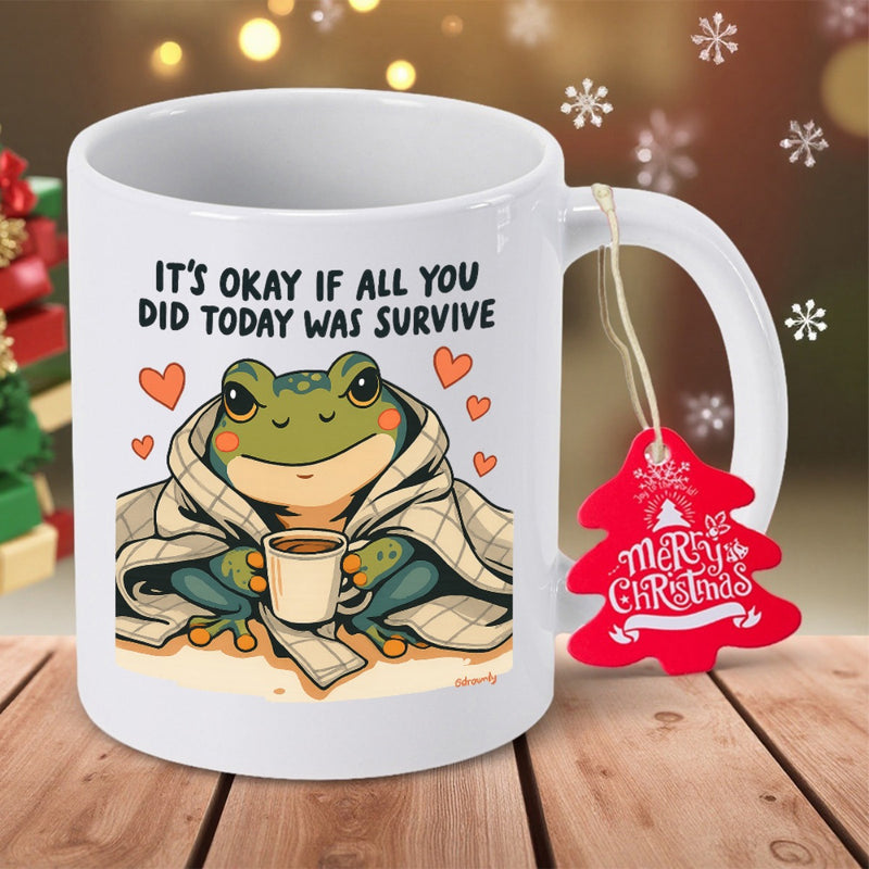 Tailorly White Ceramic 11 oz Mug - Its Okay If All You Did Today Was Survive Cozy Green Frog Wrapped In Blanket Holding Coffee Among Warm Hearts Frog