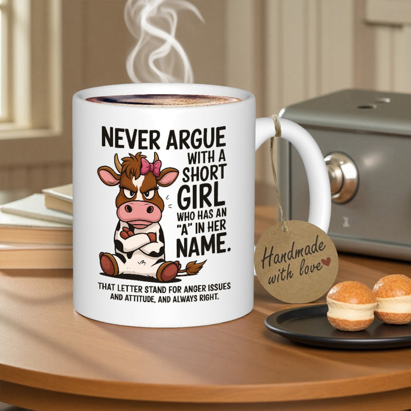 Tailorly White Ceramic 11 oz Mug - Never Argue With A Short Girl Who Has An A In Her Name Angry Cartoon Animal Wearing Pink Bow Sitting With Crossed Arms Cow