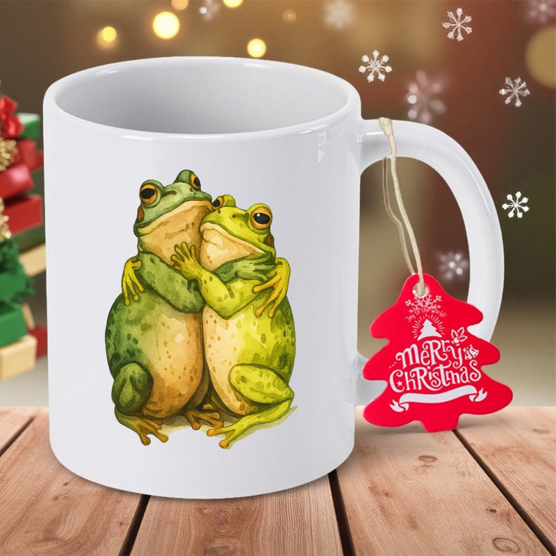 Tailorly White Ceramic 11 oz Mug - Merry Christmas Two Adorable Green Frogs Embracing Each Other Within A Festive Scene Frogs