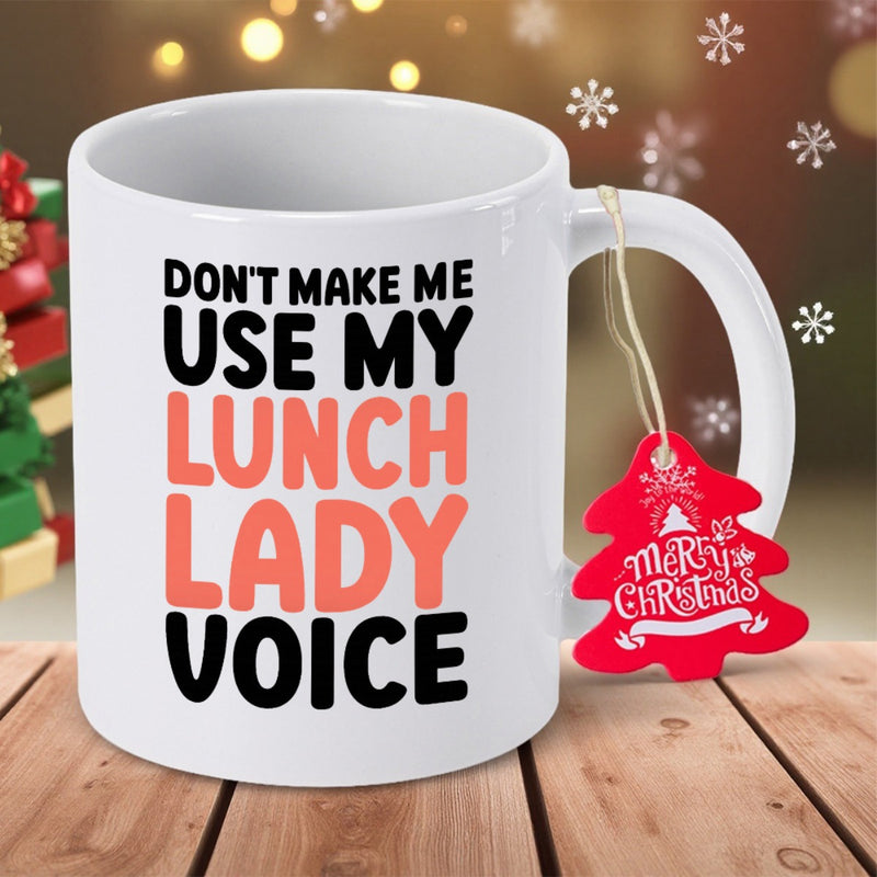 Tailorly White Ceramic 11 oz Mug - Don't Make Me Use My Lunch Lady Voice Simple White Ceramic Cup On Wooden Surface With Holiday Ornaments Mug