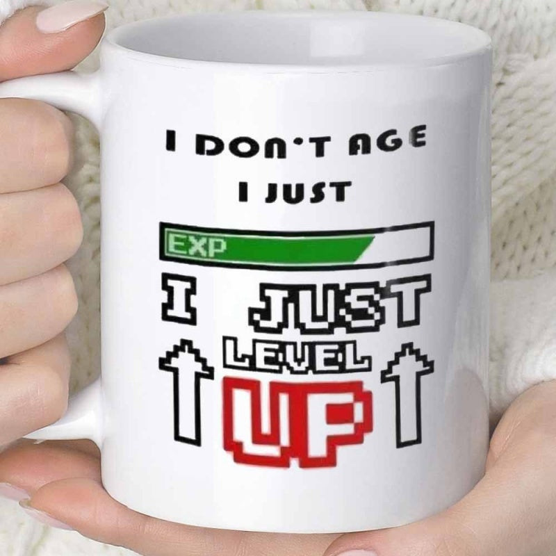 Tailorly White Ceramic 11 oz Mug - I Dont Age I Just Exp I Just Level Up Vibrant Green Progress Bar With Floating Digital Pixelated Arrows Graphic