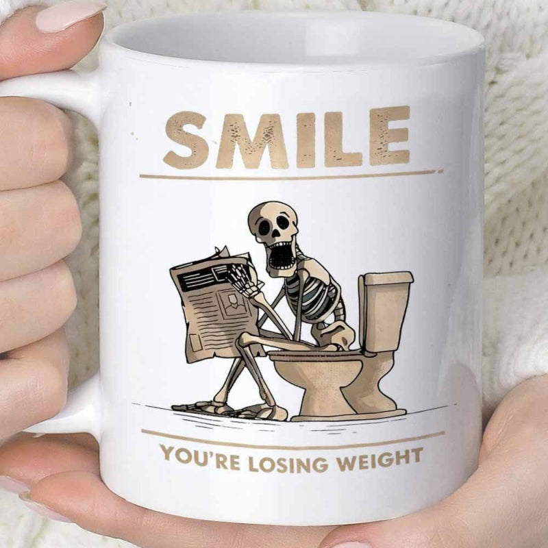 Tailorly White Ceramic 11 oz Mug - Smile Youre Losing Weight Funny Skeleton Sitting On A Toilet Reading A Newspaper Skeleton