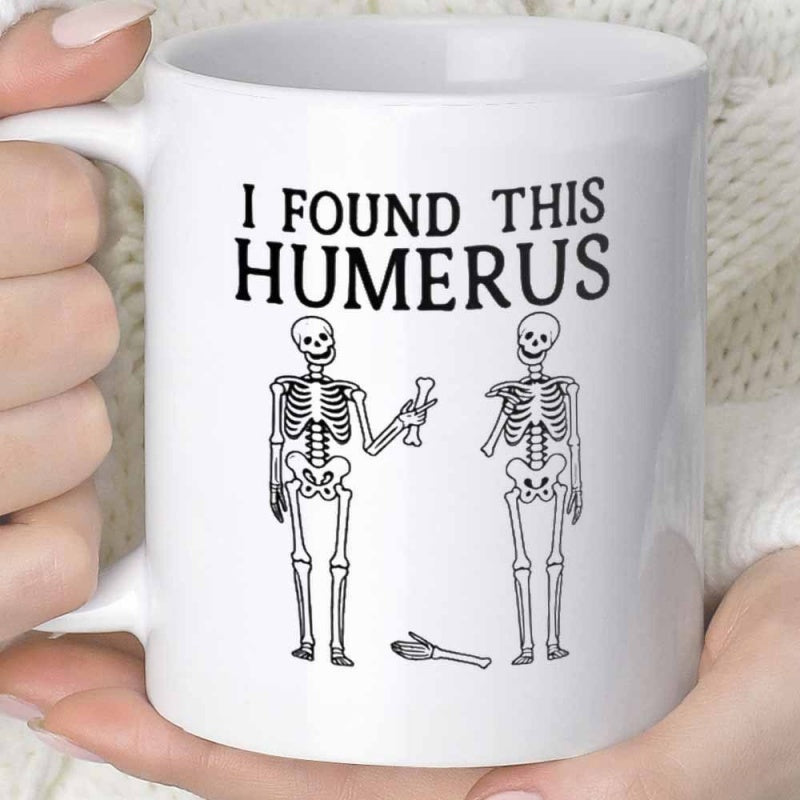 Tailorly White Ceramic 11 oz Mug - I Found This Humerus Funny Medical Joke Two Skeletons Standing Holding A Broken Bone Arm Skeleton
