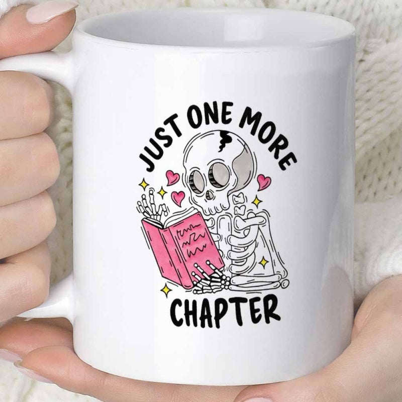 Tailorly White Ceramic 11 oz Mug - Just One More Chapter Adorable Cartoon Skeleton Reading A Pink Book Amidst Hearts Skeleton